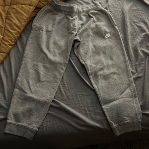 Nike kids gray sweat pants size large.